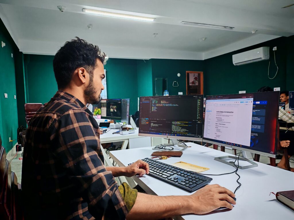 software engineer jobs in Redmond - developer working on code in office
