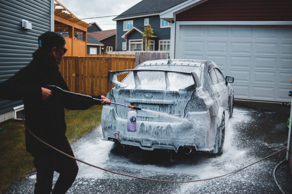 specialized cleaner jobs in Canada - worker washing car