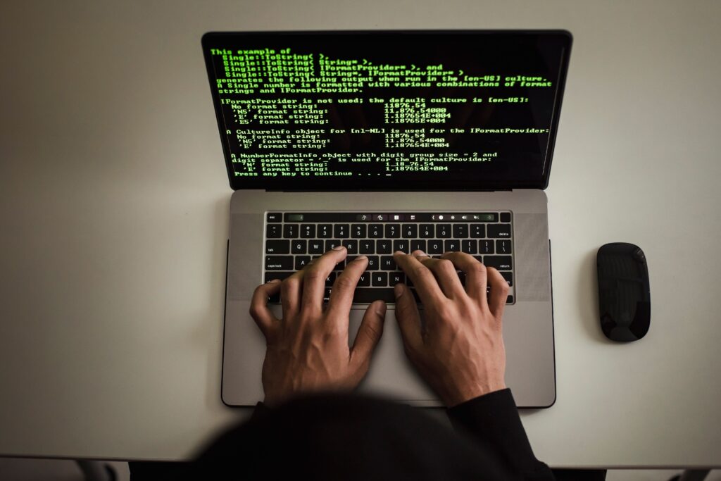 applied AI engineer jobs in London - software developer coding on laptop