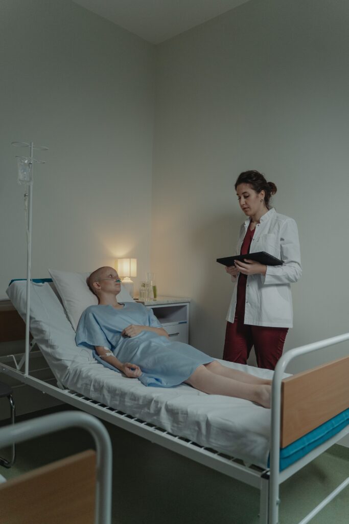 staff nurse jobs in Leeds - nurse consulting patient in hospital
