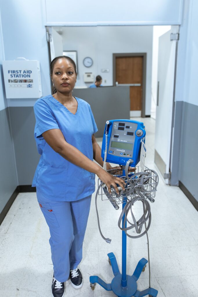 Staff nurse jobs in the UK - nurse in blue scrubs in hospital