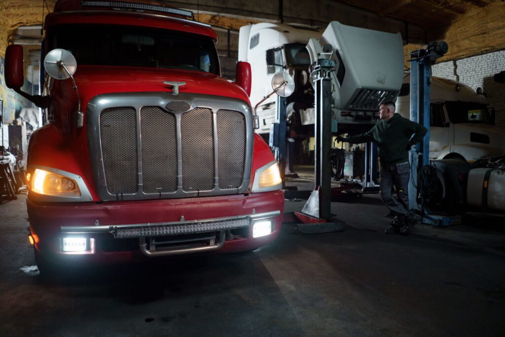 Truck mechanic jobs in Canada - mechanics working on trucks in garage