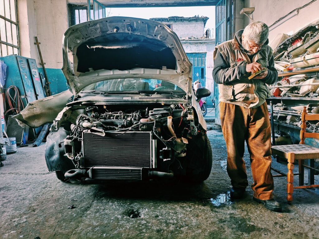 automobile mechanic jobs in Canada - mechanic repairing car in workshop